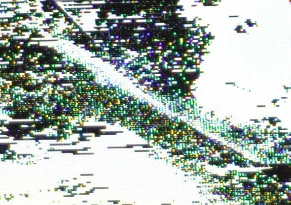 Broken liquid crystal, pixels bleeding into colour.