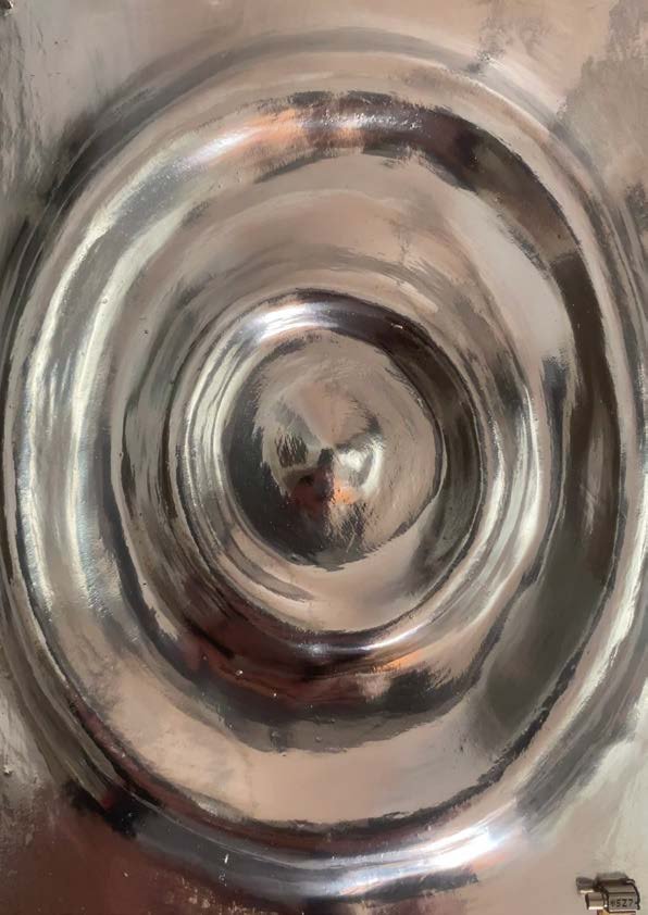 Concentric waves in metalized ceramic, seen from above.